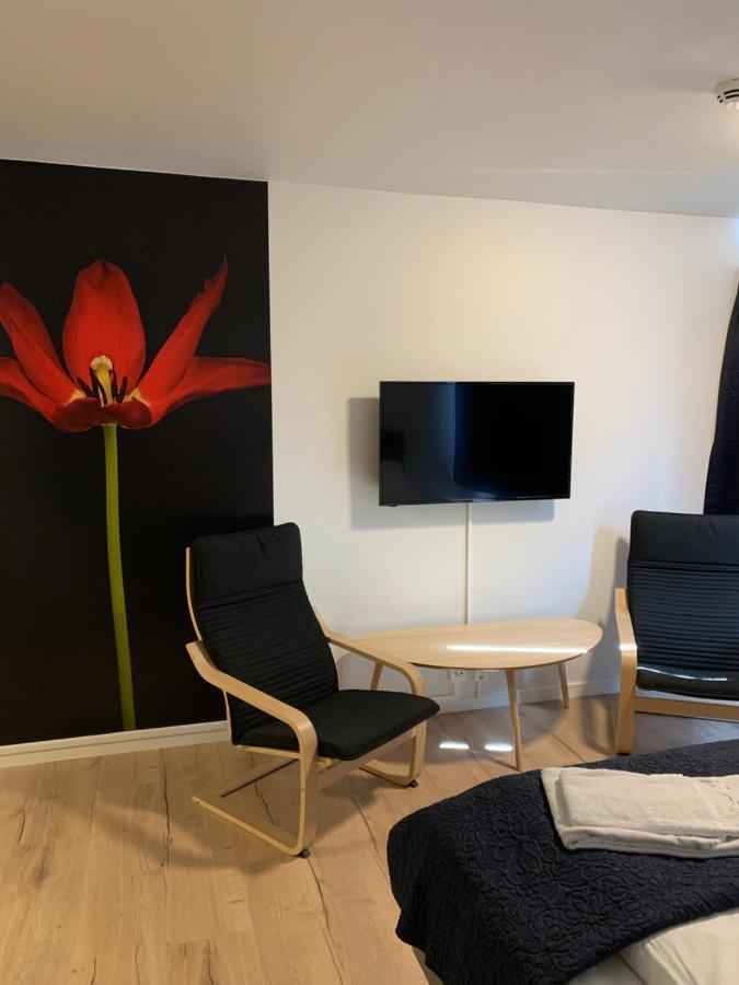 Husnes Sentrum Hotell Esterno foto