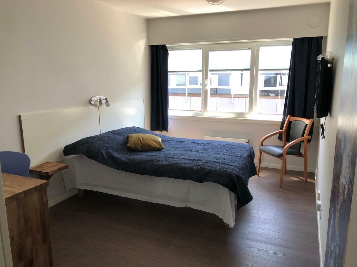 Husnes Sentrum Hotell Esterno foto