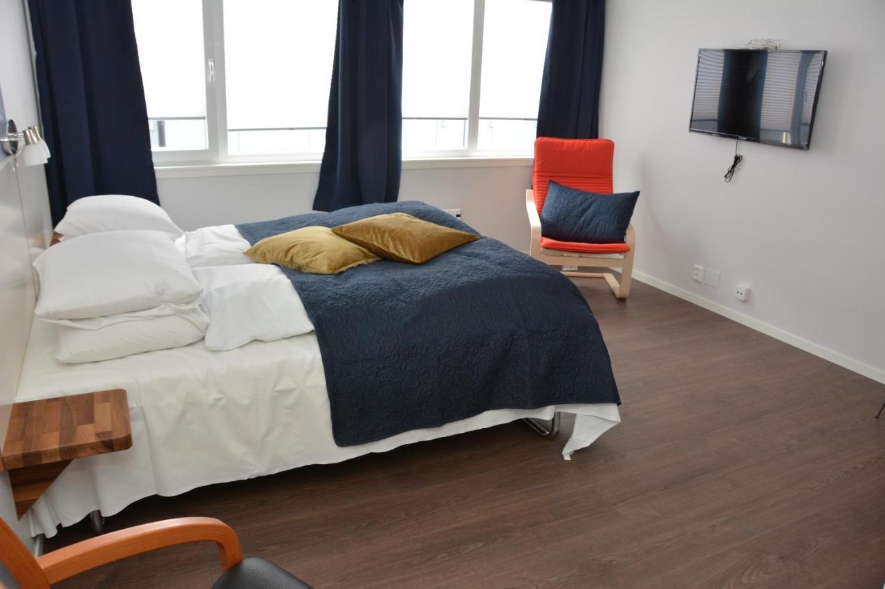 Husnes Sentrum Hotell Esterno foto